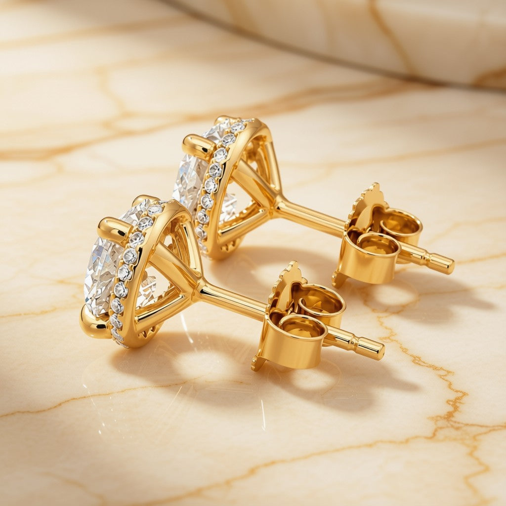 Lab-grown diamond halo stud earrings in 14K yellow gold, side view showing posts