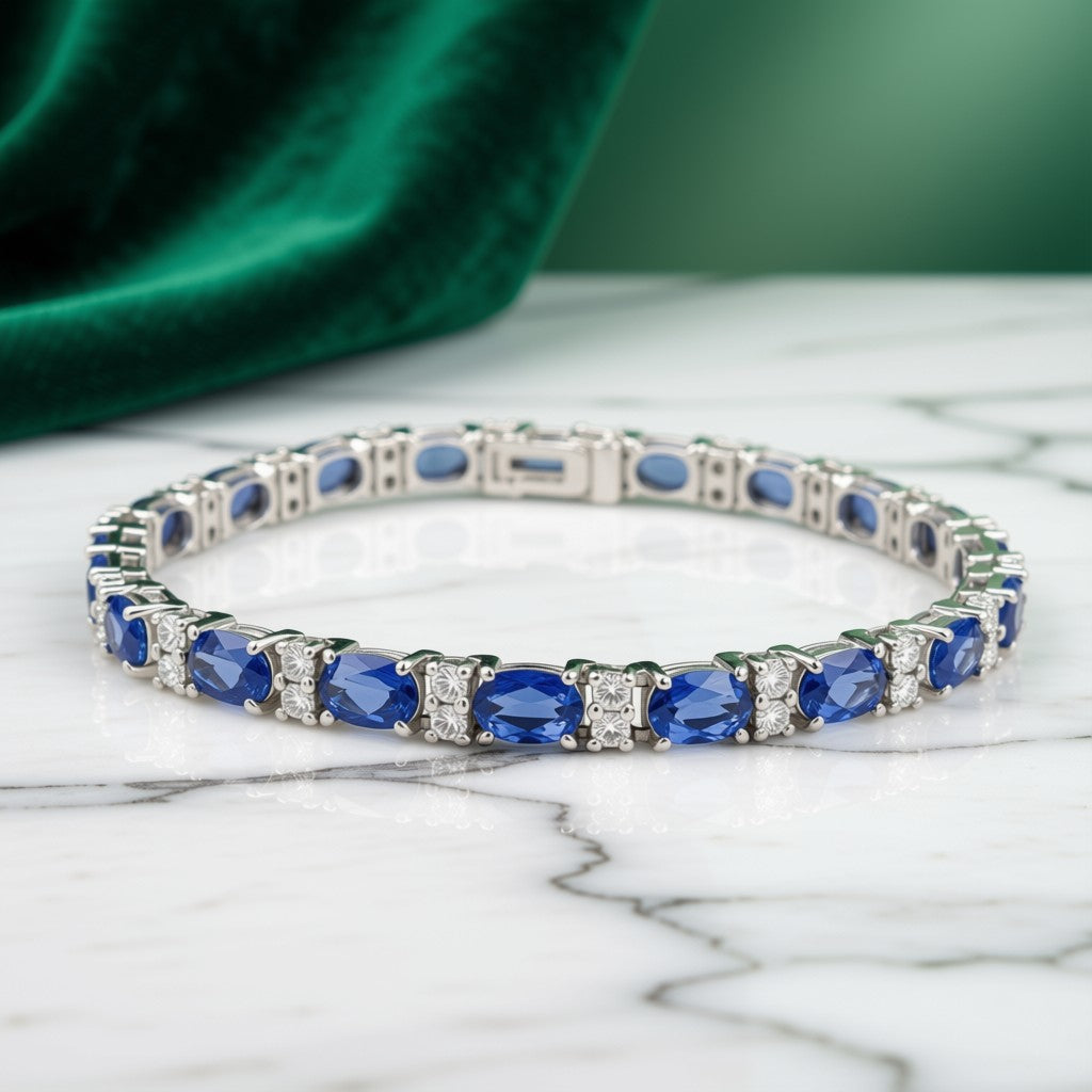 Oval Sapphire and Diamond Tennis Bracelet in 14K White Gold - angle view