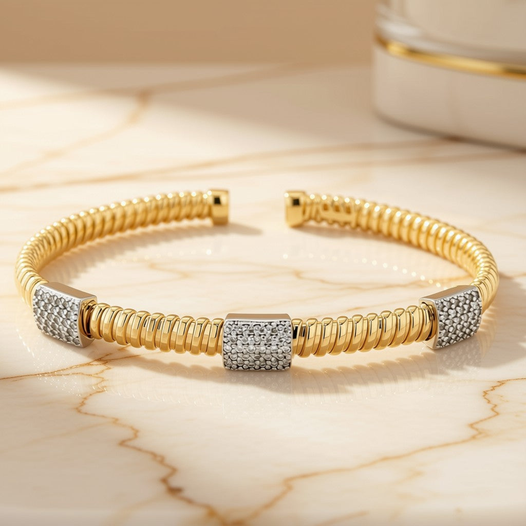 Diamond Pavé Cuff Bracelet in 14K Two-Tone Gold on marble surface